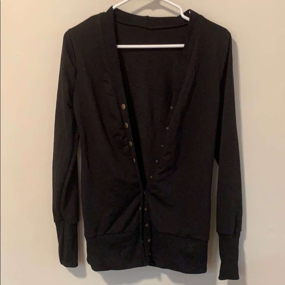 Black cardigan with gold snap buttons